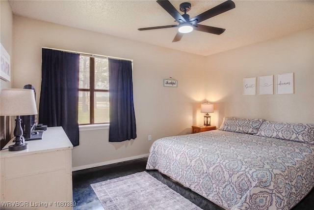 3745 E 420th Rd, Adair, OK 74330 - bedroom with baseboards and a ceiling fan
