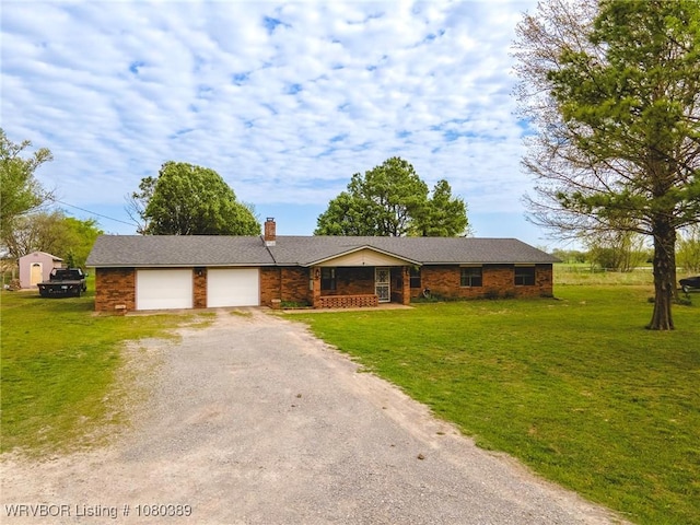 3745 E 420th Rd, Adair, OK 74330 - single story home with a chimney, a front lawn, driveway, and an attached garage