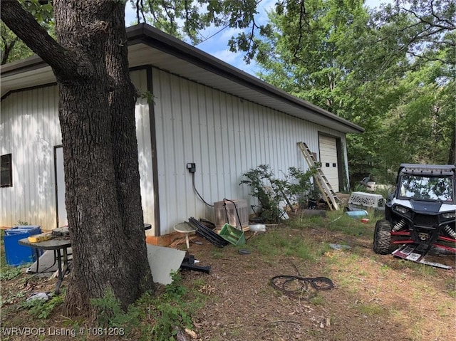 2904 Cedar Valley Dr, Greenwood, AR 72936 - view of side of home with a garage