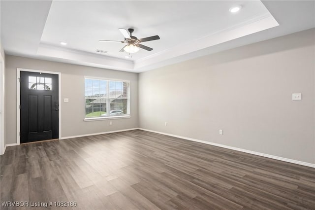 2325 Amy Ln, Van Buren, AR 72956 - entryway featuring a raised ceiling, dark wood-type flooring, a ceiling fan, recessed lighting, and ornamental molding
