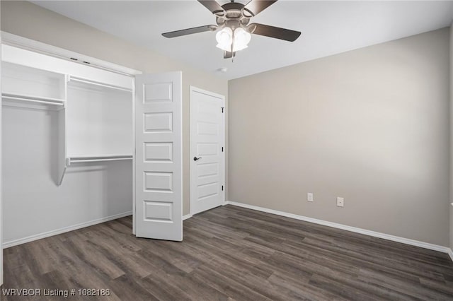 2325 Amy Ln, Van Buren, AR 72956 - unfurnished bedroom featuring dark wood finished floors, a closet, and ceiling fan