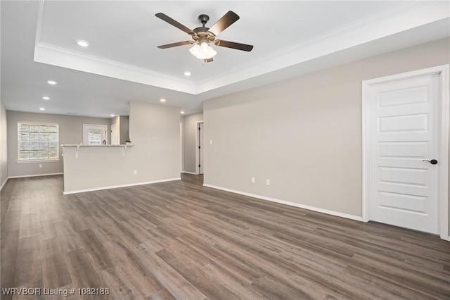 2325 Amy Ln, Van Buren, AR 72956 - unfurnished living room with a raised ceiling, a ceiling fan, crown molding, recessed lighting, and dark wood-style flooring