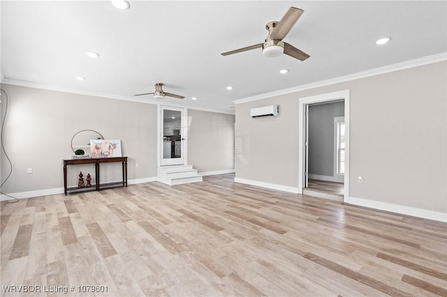 unfurnished living room with light wood finished floors, a wall mounted air conditioner, a ceiling fan, and ornamental molding