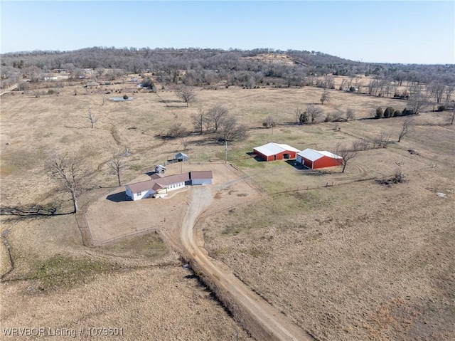 birds eye view of property featuring a rural view