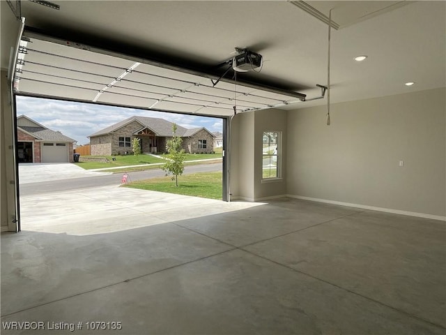 garage featuring a garage door opener