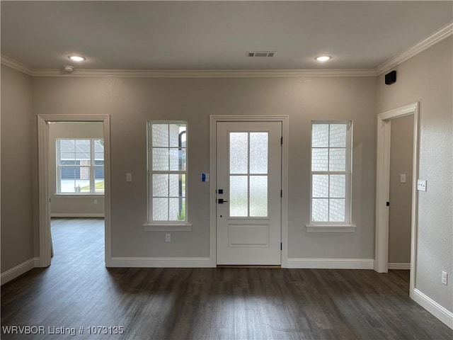 doorway to outside featuring dark hardwood / wood-style flooring and ornamental molding