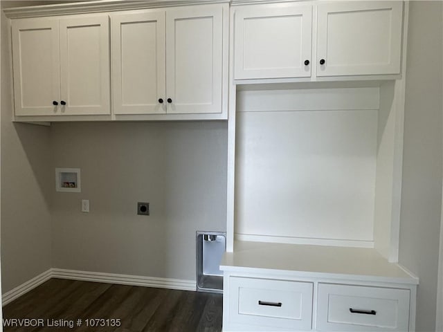 washroom featuring cabinets, dark wood-type flooring, washer hookup, and hookup for an electric dryer