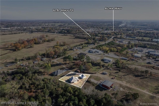 birds eye view of property featuring a rural view