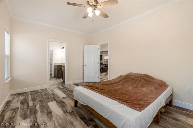 bedroom featuring ornamental molding, ceiling fan, billiards, hardwood / wood-style floors, and connected bathroom