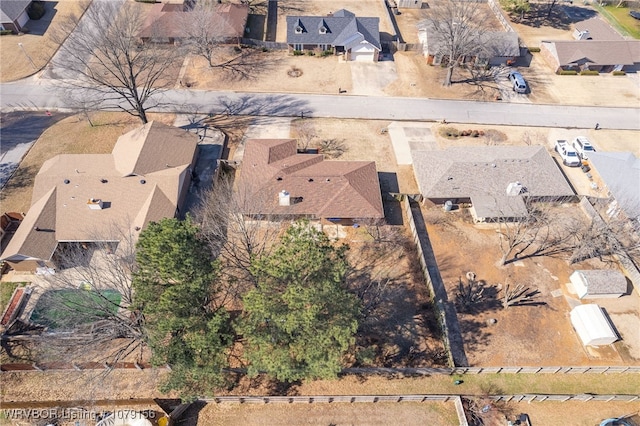 birds eye view of property with a residential view