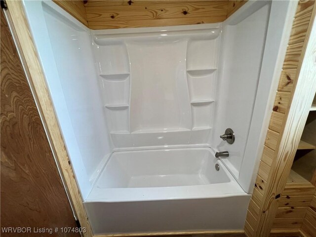 bathroom featuring  shower combination