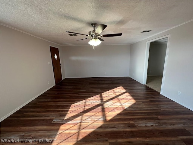 unfurnished room featuring a textured ceiling, dark hardwood / wood-style flooring, ceiling fan, and crown molding