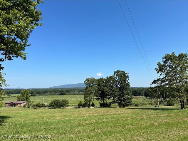 mountain view featuring a rural view