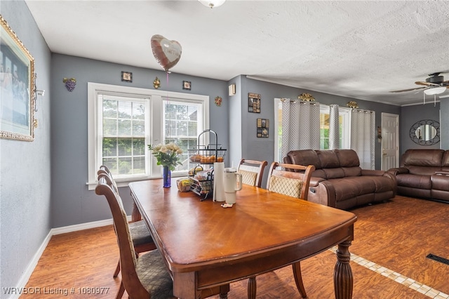 4209 Old Jenny Lind Rd, Fort Smith, AR 72901 - dining area with baseboards, ceiling fan, and a textured ceiling