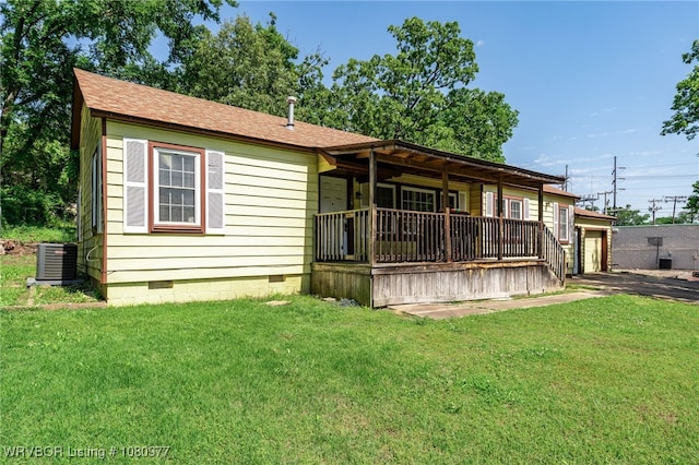 4209 Old Jenny Lind Rd, Fort Smith, AR 72901 - view of front of home featuring crawl space, central AC unit, a front yard, driveway, and an attached garage