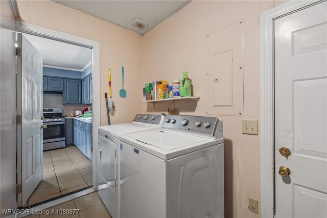 4209 Old Jenny Lind Rd, Fort Smith, AR 72901 - washroom featuring separate washer and dryer, light tile patterned flooring, and electric panel