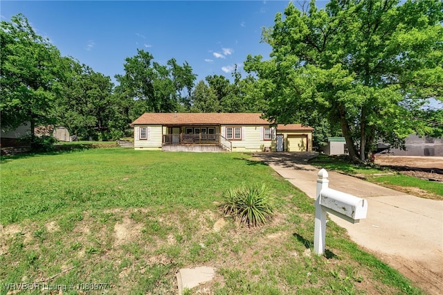 4209 Old Jenny Lind Rd, Fort Smith, AR 72901 - ranch-style home with concrete driveway, a porch, a front yard, and an attached garage
