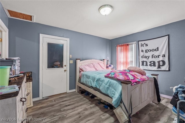 4209 Old Jenny Lind Rd, Fort Smith, AR 72901 - bedroom with wood finished floors and baseboards
