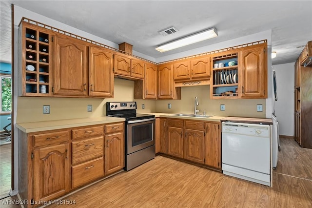 1310 Pigeon Creek Rd, Mountainburg, AR 72946 - kitchen with dishwasher, stainless steel electric range, open shelves, and light wood finished floors