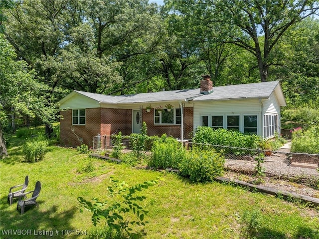 1310 Pigeon Creek Rd, Mountainburg, AR 72946 - back of house featuring a chimney and brick siding