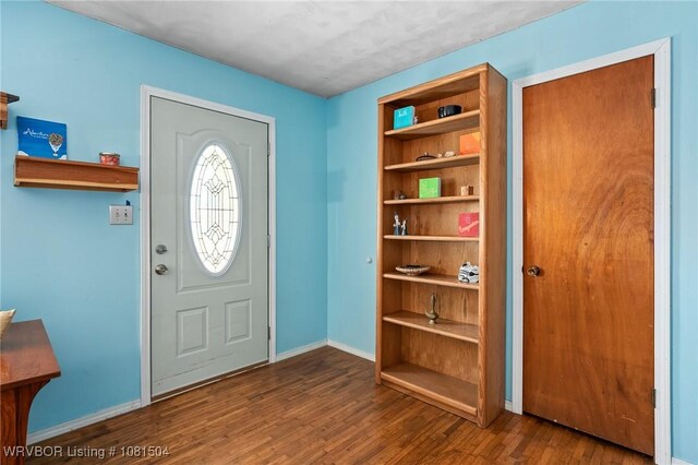 1310 Pigeon Creek Rd, Mountainburg, AR 72946 - entryway with wood finished floors and baseboards
