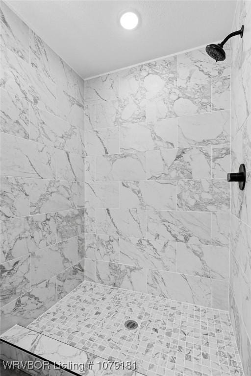 details featuring a tile shower