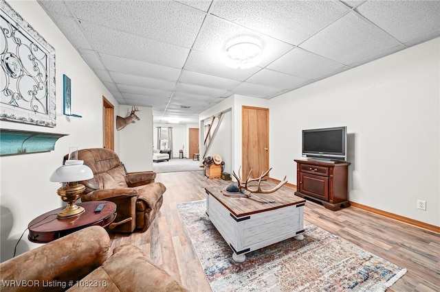 106078 S 4715th Rd, Muldrow, OK 74948 - living room with light wood finished floors and a paneled ceiling