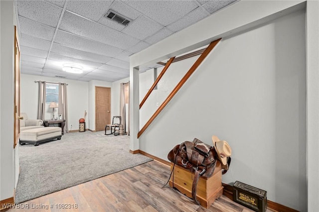 106078 S 4715th Rd, Muldrow, OK 74948 - basement with a paneled ceiling, wood finished floors, and stairway