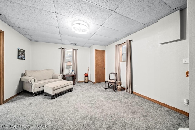 106078 S 4715th Rd, Muldrow, OK 74948 - living area featuring carpet floors and a paneled ceiling