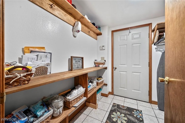 106078 S 4715th Rd, Muldrow, OK 74948 - entryway featuring light tile patterned floors and baseboards