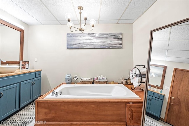106078 S 4715th Rd, Muldrow, OK 74948 - bathroom with a paneled ceiling, vanity, a bath, and a chandelier