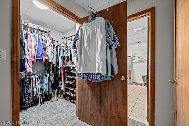 106078 S 4715th Rd, Muldrow, OK 74948 - spacious closet featuring tile patterned flooring