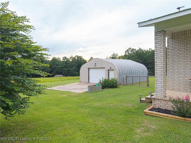 106078 S 4715th Rd, Muldrow, OK 74948 - view of green lawn featuring an outdoor structure and a garage