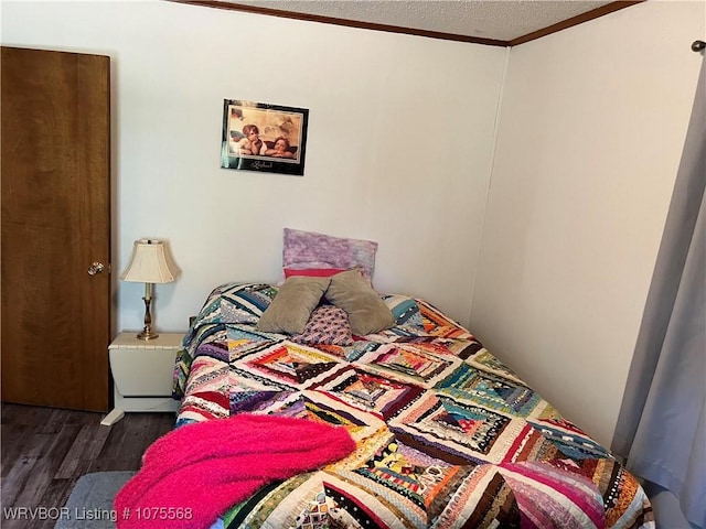 bedroom featuring dark hardwood / wood-style floors