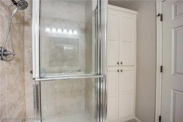 bathroom featuring an enclosed shower