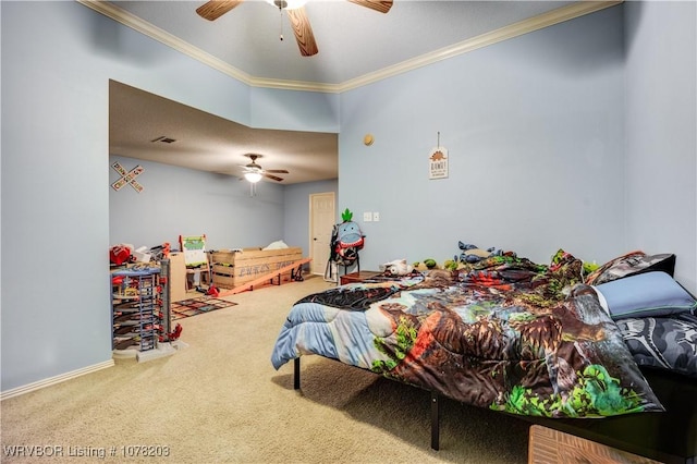 carpeted bedroom featuring ceiling fan and crown molding