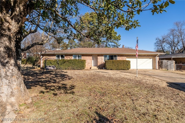 single story home featuring a garage