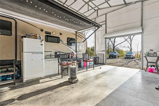 garage featuring freestanding refrigerator
