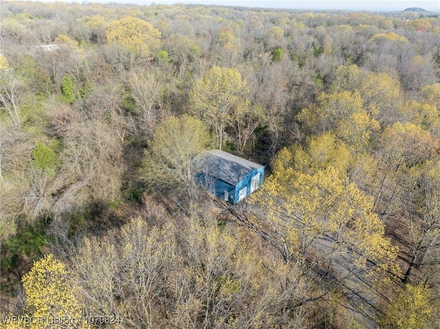 drone / aerial view with a view of trees