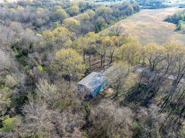 bird's eye view with a view of trees