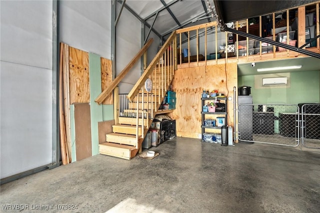 garage featuring an AC wall unit