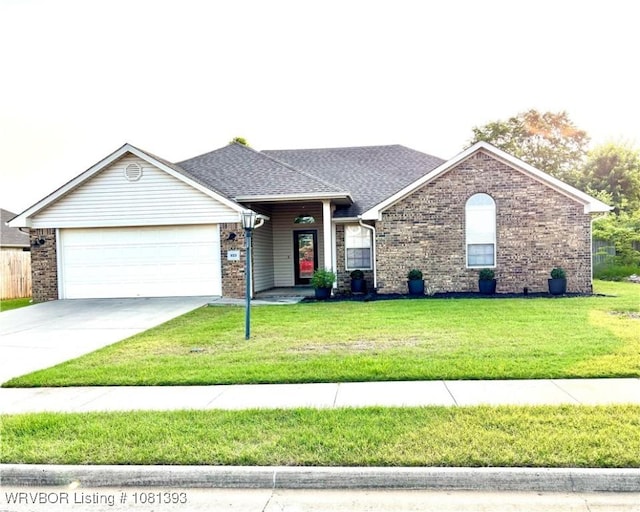 823 Live Oak Way, Alma, AR 72921 - single story home featuring an attached garage, a front lawn, driveway, and roof with shingles