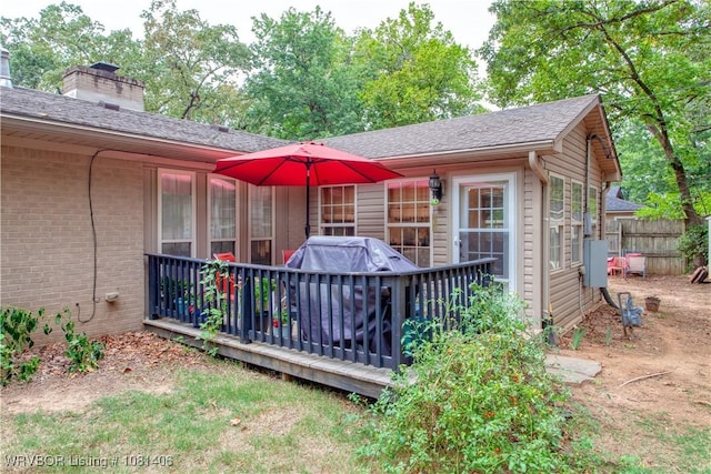 1326 56th Ter, Fort Smith, AR 72904 - back of house with a deck, roof with shingles, and brick siding