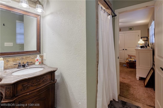 1326 56th Ter, Fort Smith, AR 72904 - bathroom featuring vanity, a textured wall, and a shower with curtain