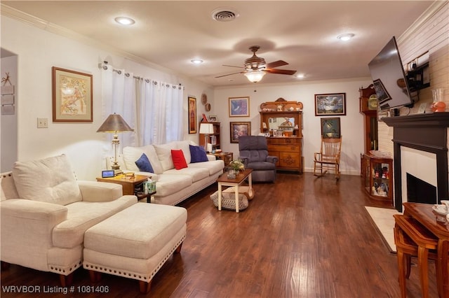 1326 56th Ter, Fort Smith, AR 72904 - living area with a ceiling fan, crown molding, a fireplace, dark wood-type flooring, and recessed lighting