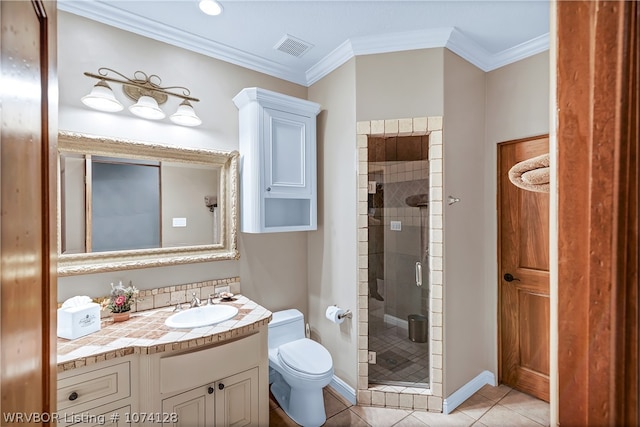 bathroom with tile patterned floors, vanity, ornamental molding, and walk in shower
