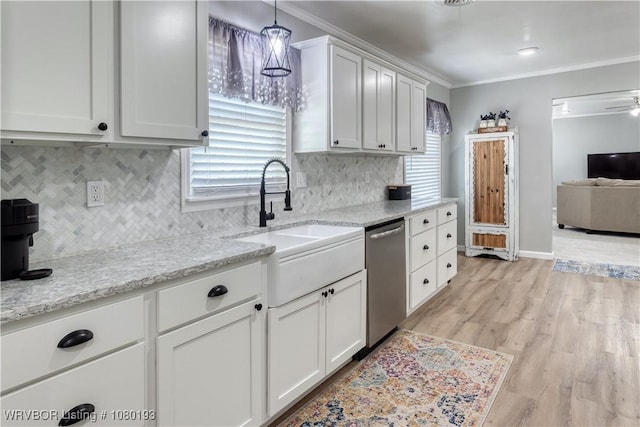 3811 Dallas St, Fort Smith, AR 72903 - kitchen featuring stainless steel dishwasher, a sink, healthy amount of natural light, backsplash, and crown molding