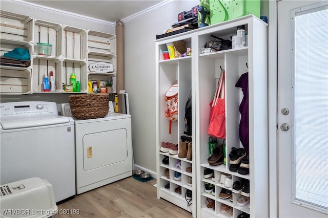 3811 Dallas St, Fort Smith, AR 72903 - washroom with crown molding, separate washer and dryer, and light wood-style flooring