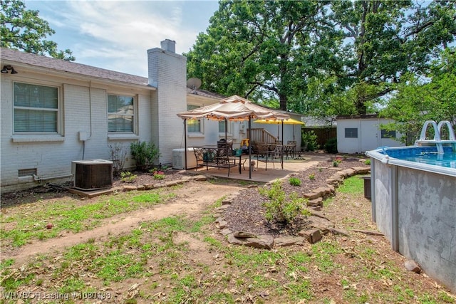 3811 Dallas St, Fort Smith, AR 72903 - view of yard with central AC, a patio, and an outdoor pool