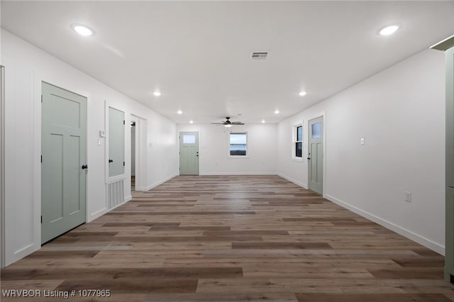 hallway featuring wood-type flooring